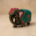 Wooden green stone down trunk elephant