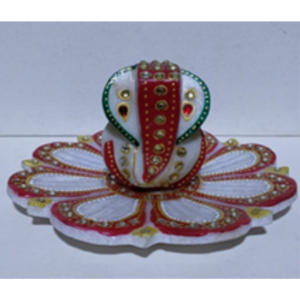 Marble lotus thali with marble ganesha.