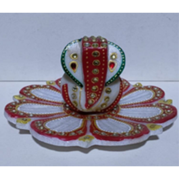 Marble lotus thali with marble ganesha.
