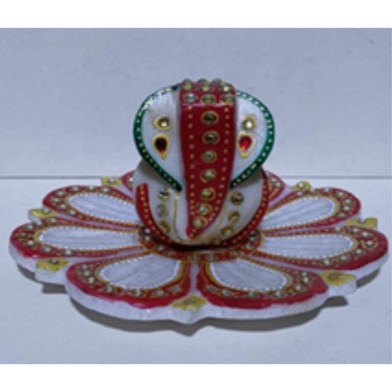 Marble lotus thali with marble ganesha.