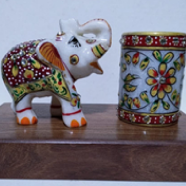 Marble pen stand and marble elephant with wooden stand.