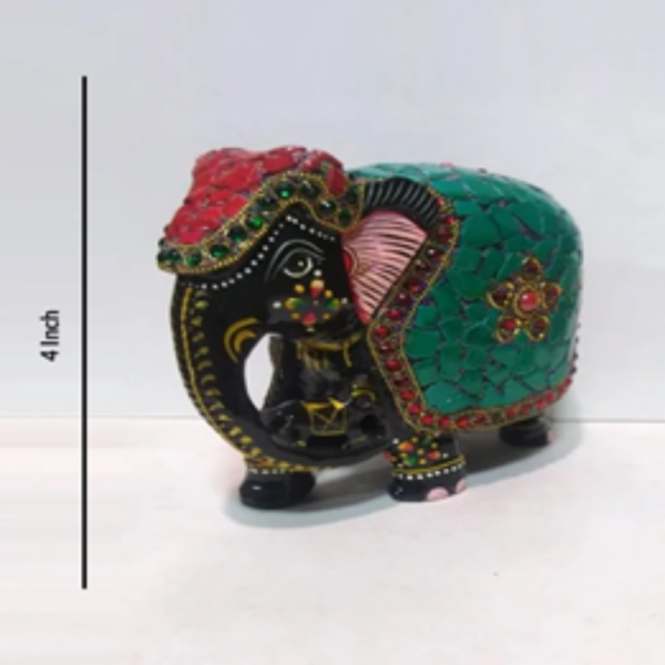 Wooden green stone down trunk elephant.